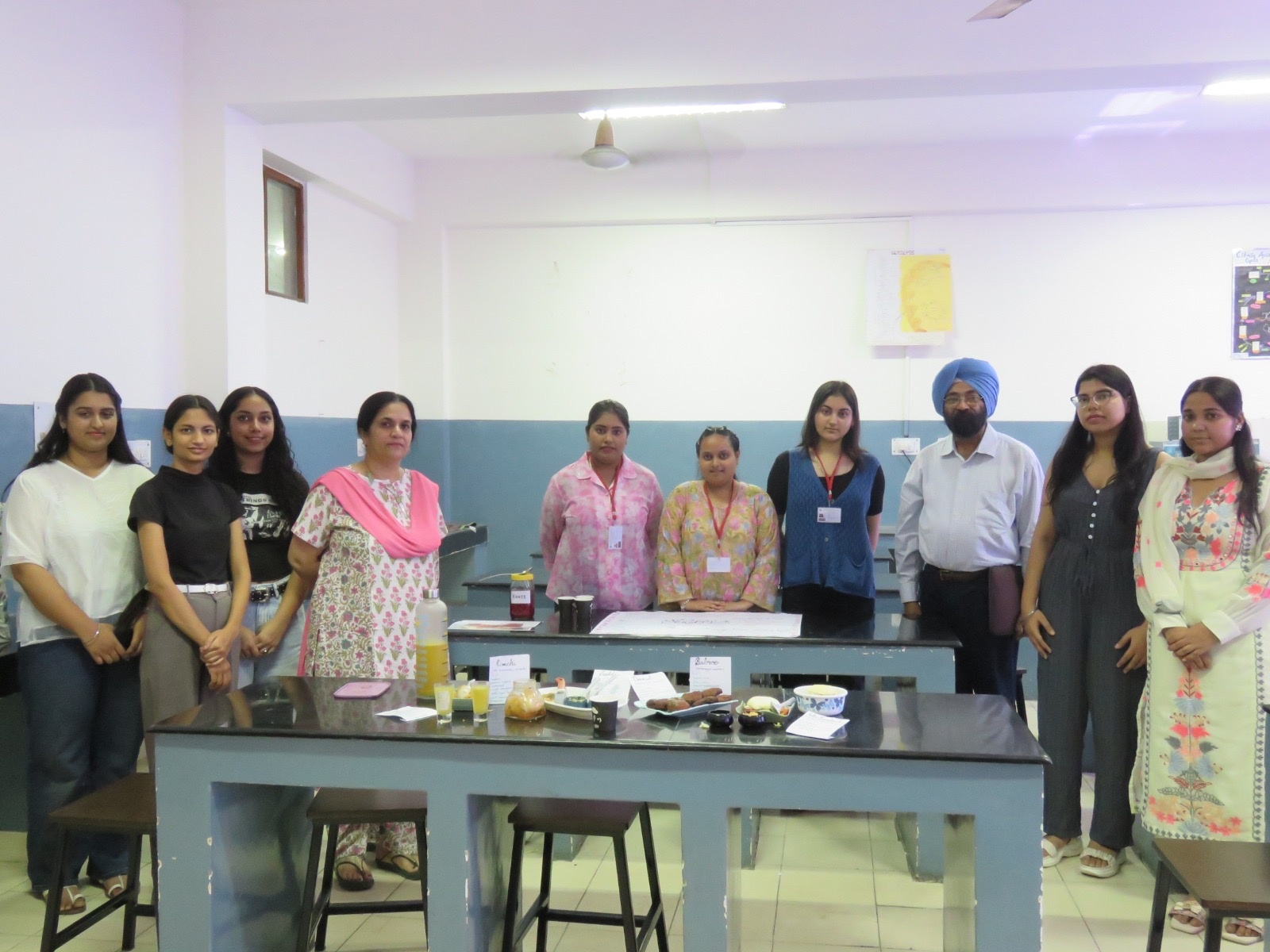 Showcasing innovation in the Microbial Biotechnology laboratory — student-led demonstrations during a departmental event.